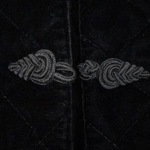 Black velvet jacket.